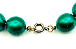 Luminescent Gleaming Green Enamel Coated Beads in a Long Sturdy Necklace