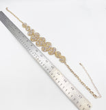 Textured Necklace with Oval Mounts with Faux Druzy of Faceted Metallic Cones and Yellow Beads