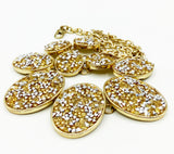 Textured Necklace with Oval Mounts with Faux Druzy of Faceted Metallic Cones and Yellow Beads