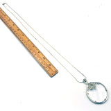 Elegant Magnifying Glass Rose Pendant on Gold Tone Metal Necklace