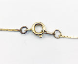 Elegant Magnifying Glass Rose Pendant on Gold Tone Metal Necklace