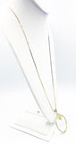 Elegant Magnifying Glass Rose Pendant on Gold Tone Metal Necklace