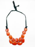 Bold Cheerful Orange Tagua Seed Necklace on Leather