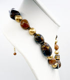 Earthy Tiger's Eye, Swirled Glass, Plastic and Golden Bead Necklace
