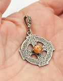 Cryptic Celtic Cross Pendant of Silver-Tone Metal with Faux Amber Cabochon Four-Petal Flower