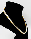 Sturdy Glowing Faux Pearl Necklace strung on Gold-Tone Metal Chain with Patented Clasp
