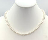 Sturdy Glowing Faux Pearl Necklace strung on Gold-Tone Metal Chain with Patented Clasp