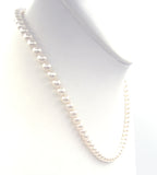 Sturdy Glowing Faux Pearl Necklace strung on Gold-Tone Metal Chain with Patented Clasp