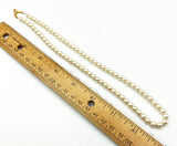 Sturdy Glowing Faux Pearl Necklace strung on Gold-Tone Metal Chain with Patented Clasp
