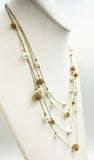 Romantic AVENUE Four Strand Necklace of Faux Pearls and GoldTone Beads