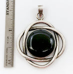 Mystical Pendant of Silver-tone Metal Ovals with a Black Enamel Cabochon Disc