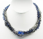 Interesting 7-Strand Twist Necklace with Rhinestones, Beads + Silver-Tone Chain