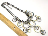 Mystical Circles with Dangling Iridescent Clear Beads on Black-tone Chain